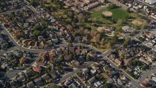 5K aerial stock footage reverse view of suburban neighborhoods, reveal Meadow Park, San Luis Obispo, California Aerial Stock Footage | AXSF16_156