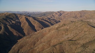 5K aerial stock footage flying by rolling hills, San Luis Obispo County, California Aerial Stock Footage | AXSF17_017