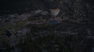 5K aerial stock footage fly by a golf course at the base of a mountain, San Luis Obispo County, California, sunset Aerial Stock Footage | AXSF17_059