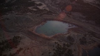 5K aerial stock footage of flying by small lake in Los Padres National Forest, California, sunset Aerial Stock Footage | AXSF17_066