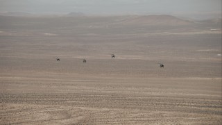 HD stock footage aerial video of tracking military helicopters over the Mojave Desert, California Aerial Stock Footage | CAP005_002