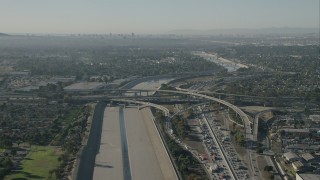 HD stock footage aerial video of freeway interchange and LA River in Lynwood, California Aerial Stock Footage | CAP_003_004