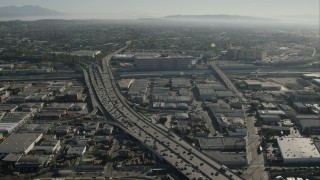 CAP_004_020 - HD stock footage aerial video of light freeway traffic in Boyle Heights, Los Angeles, California