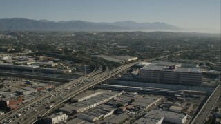 HD stock footage aerial video flyby light traffic on freeway through Boyle Heights, Los Angeles, California Aerial Stock Footage | CAP_004_021