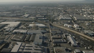 CAP_004_022 - HD stock footage aerial video warehouses, water tower, and LA River in Vernon, California