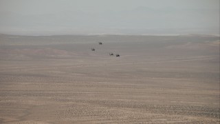 HD stock footage aerial video of military helicopters over the Mojave Desert, California Aerial Stock Footage | CAP_005_003