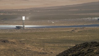 HD stock footage aerial video zoom to tighter view of the Ivanpah Solar Electric Generating System, Mojave Desert, California Aerial Stock Footage | CAP_005_006