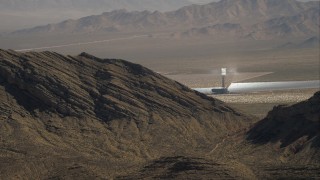 HD stock footage aerial video of one of the Ivanpah Solar Electric Generating System solar towers, Mojave Desert, California Aerial Stock Footage | CAP_005_011