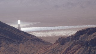 HD stock footage aerial video of solar panels and tower at Ivanpah Solar Electric Generating System, Mojave Desert, California Aerial Stock Footage | CAP_005_015