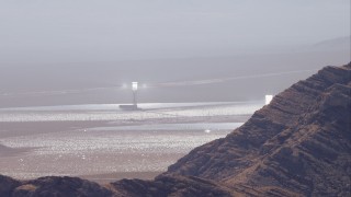 HD stock footage aerial video of a solar tower at the Ivanpah Solar Electric Generating System, Mojave Desert, California Aerial Stock Footage | CAP_005_017