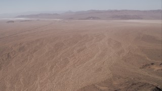 HD stock footage aerial video of a wider desert valley, Mojave Desert, California Aerial Stock Footage | CAP_005_023