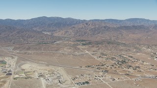 HD stock footage aerial video of neighborhoods near the California Aqueduct and mountains in Palmdale, California Aerial Stock Footage | CAP_006_010