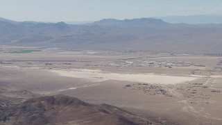 CAP_006_013 - HD stock footage aerial video of Raytheon Barstow surrounded by the Mojave Desert, California