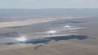 HD stock footage aerial video of cloud shadows on the Ivanpah Solar Electric Generating System in California Aerial Stock Footage | CAP_006_034