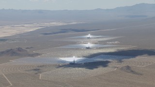 HD stock footage aerial video of a view of the Ivanpah Solar Electric Generating System in California with cloud shadow across the arrays Aerial Stock Footage | CAP_006_037