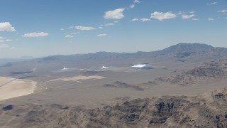 HD stock footage aerial video of a reverse view of the three solar arrays at the Ivanpah Solar Electric Generating System in California Aerial Stock Footage | CAP_006_045