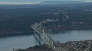 HD stock footage aerial video tilt from the Tacoma Narrows Bridge to reveal the Olympic Mountains, Washington Aerial Stock Footage | CAP_009_014