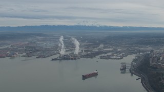 HD stock footage aerial video of Mount Rainier and the Port of Tacoma seen from Commencement Bay, Washington Aerial Stock Footage | CAP_009_018