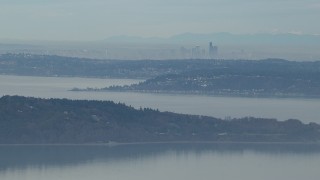 HD stock footage aerial video of the Downtown Seattle skyline seen from Puget Sound, Washington Aerial Stock Footage | CAP_009_023