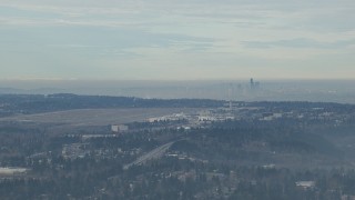 HD stock footage aerial video of Seattle Tacoma Airport and the Downtown Seattle skyline seen from south of the city, Washington Aerial Stock Footage | CAP_009_030