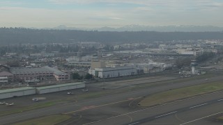 HD stock footage aerial video flyby the control tower and hangars at Boeing Field, Washington Aerial Stock Footage | CAP_009_042