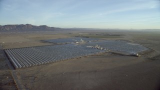 HD stock footage aerial video of a PG&E power plant in Daggett, California at sunrise Aerial Stock Footage | CAP_011_004