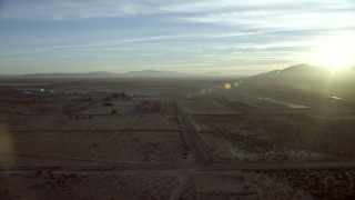 HD stock footage aerial video approach the Barstow-Daggett Airport in California at sunrise Aerial Stock Footage | CAP_011_005