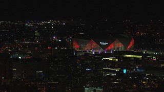 HD stock footage aerial video of Mercedes Benz Stadium at night in Atlanta, Georgia Aerial Stock Footage | CAP_013_001