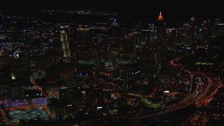 HD stock footage aerial video of orbiting skyscrapers and city buildings at night, Downtown and Midtown Atlanta, Georgia Aerial Stock Footage | CAP_013_009