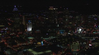 HD stock footage aerial video of passing city buildings and skyscrapers at night, Downtown Atlanta, Georgia Aerial Stock Footage | CAP_013_025