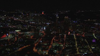 HD stock footage aerial video reverse view of city buildings and skyscrapers at night, Downtown Atlanta, Georgia Aerial Stock Footage | CAP_013_030