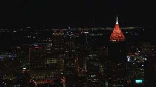 HD stock footage aerial video reverse view of SunTrust Plaza and Bank of America Plaza at night, Downtown Atlanta, Georgia Aerial Stock Footage | CAP_013_036