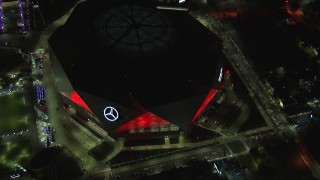 HD stock footage aerial video a bird's eye view and orbit of the stadium at nighttime, Atlanta, Georgia Aerial Stock Footage | CAP_013_055