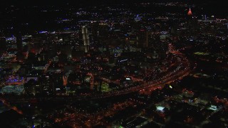 HD stock footage aerial video of approaching downtown's skyscrapers and city buildings at night, Downtown Atlanta, Georgia Aerial Stock Footage | CAP_013_068