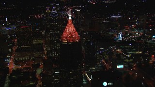 HD stock footage aerial video fly away from Bank of America Plaza at night, Midtown Atlanta, Georgia Aerial Stock Footage | CAP_013_074