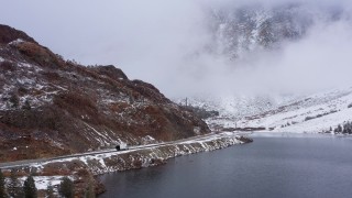 CAP_015_017 - 4K stock footage aerial video a truck driving on a road by the lake, Inyo National Forest, California