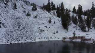 4K stock footage aerial video of ascending over snow-covered mountain slopes, Inyo National Forest, California Aerial Stock Footage | CAP_015_020