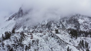 4K stock footage aerial video of passing by a snowy mountain in the Sierra Nevadas, Inyo National Forest, California Aerial Stock Footage | CAP_015_027