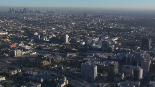 HD stock footage aerial video orbit office buildings, approach apartment and college buildings, Hollywood, California Aerial Stock Footage | CAP_016_020