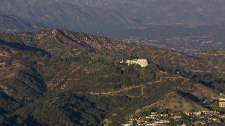 HD stock footage aerial video of flying away from Griffith Observatory in Los Angeles, California Aerial Stock Footage | CAP_016_029