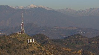 HD stock footage aerial video orbit the iconic Hollywood Sign with view of mountains in Los Angeles, California Aerial Stock Footage | CAP_016_035