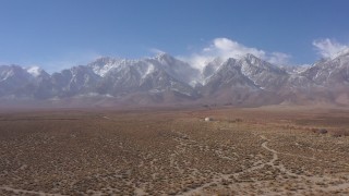 4K stock footage aerial video flying away from the Sierra Nevada Mountains in Independence, California Aerial Stock Footage | CAP_017_007