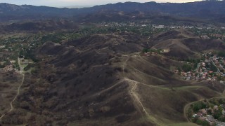 HD stock footage aerial video of flying over burned hills in Malibu, California Aerial Stock Footage | CAP_018_002