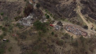 HD stock footage aerial video of a bird's eye view of homes destroyed by fire, Malibu, California Aerial Stock Footage | CAP_018_005