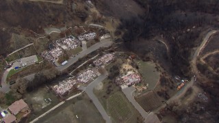 HD stock footage aerial video of a bird's eye view of homes destroyed by fire, Malibu, California Aerial Stock Footage | CAP_018_021