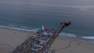 HD stock footage aerial video of orbiting Santa Monica Pier at sunset, California Aerial Stock Footage | CAP_018_066