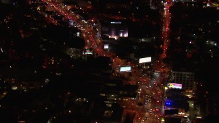 HD stock footage aerial video of following traffic on the Sunset Strip at night in West Hollywood, California Aerial Stock Footage | CAP_018_128