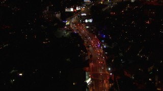 CAP_018_132 - HD stock footage aerial video of zooming to light traffic on the Sunset Strip at night in West Hollywood, California