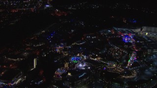 HD stock footage aerial video of an orbit of the Universal Studios Hollywood theme park at night, Universal City, California Aerial Stock Footage | CAP_018_167