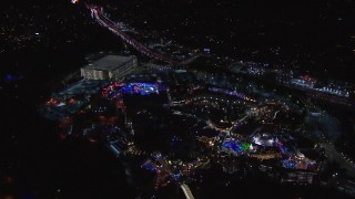 HD stock footage aerial video of the Universal Studios Hollywood theme park at night, Universal City, California Aerial Stock Footage | CAP_018_168